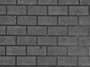 灰色 の 長方形 ブロック が 整然と 積み上げられた 壁面